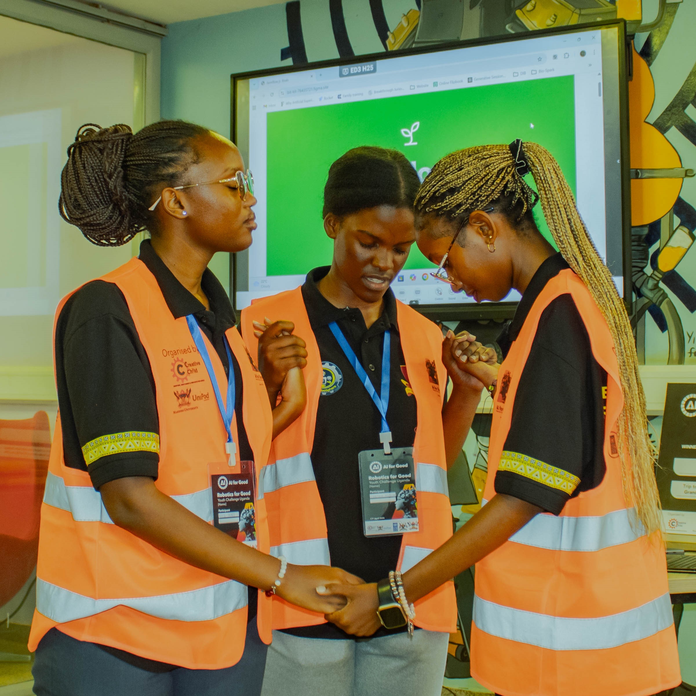 Ugandan students working on a robotics challenge